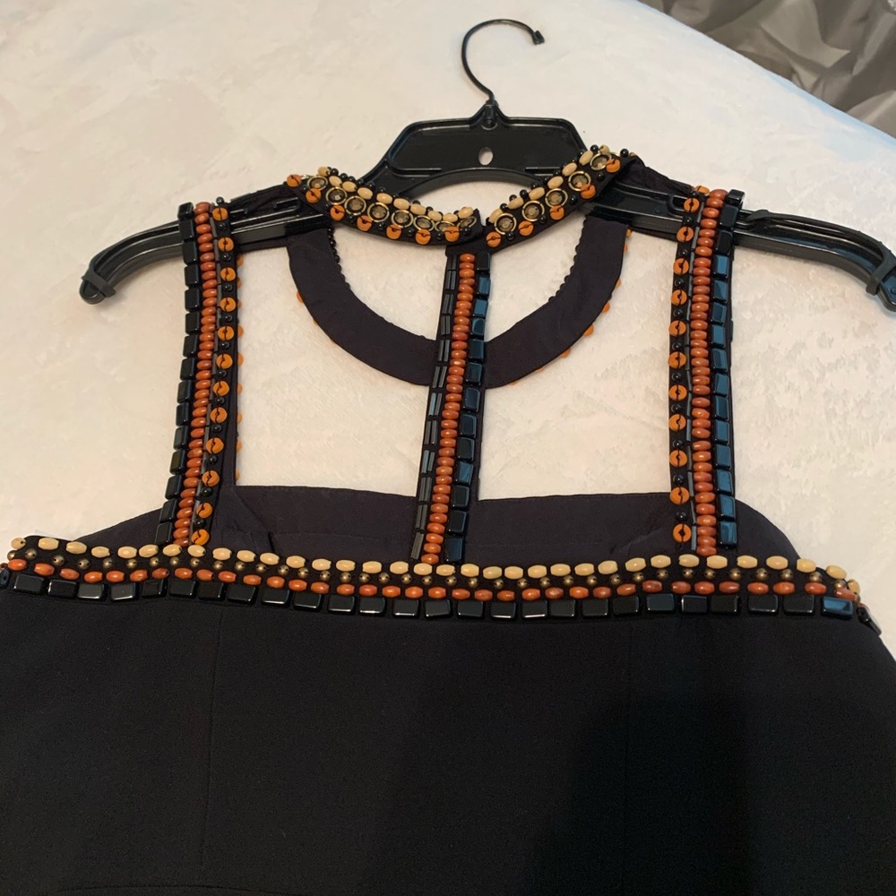 Beautiful black dress with stones brand new.